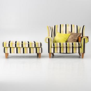 A lounge chair with foot stool, BQ of Sweden.