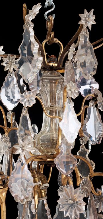 A Louis XV 18th/19th century century six-light chandelier.
