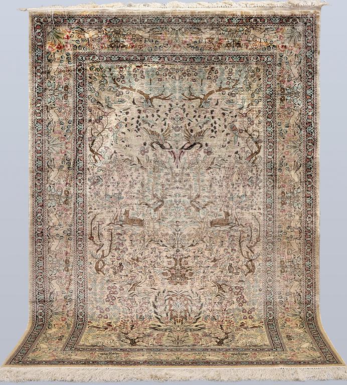 A Oriental silk carpet, 152 x 94 cm.