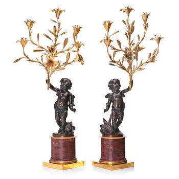 94. A pair of Louis XV/ Louis XVI five-light candelabra, second part of the 18th century.