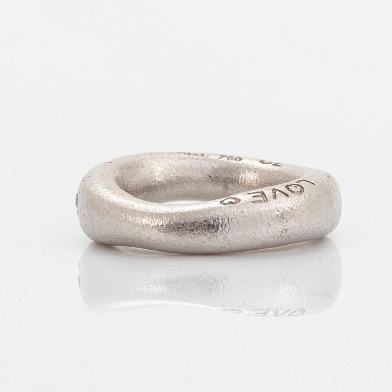 Ole Lynggaard "love ring" with brilliant-cut diamonds.