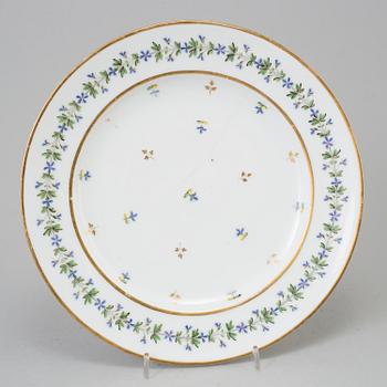 A French dinner service, circa 1800, some pieces marked M F Guerhard & Dahl.  (70 pieces).