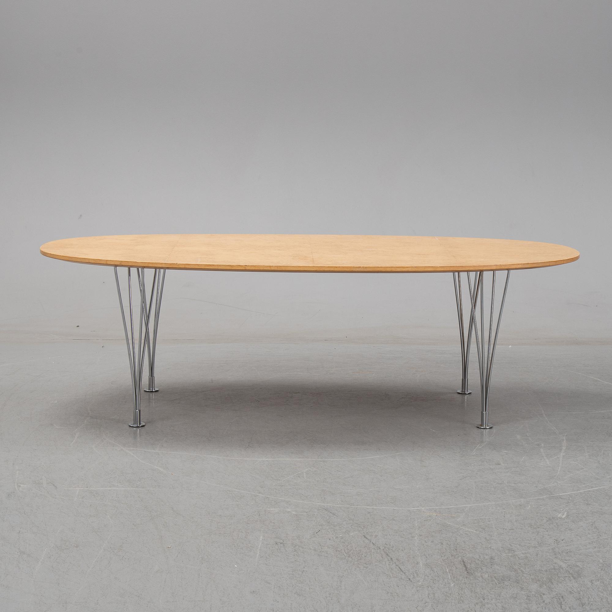 A 'Super-elliptical' birch coffee table by Piet Hein & Bruno Mathsson for Fritz Hansen.
