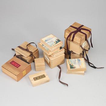 A set of 13 wooden boxes, Japan, 20th Century. Some with incense.