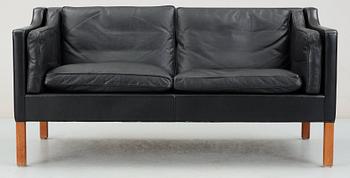 A Børge Mogensen black leather two seated sofa, Fredericia, Denmark.