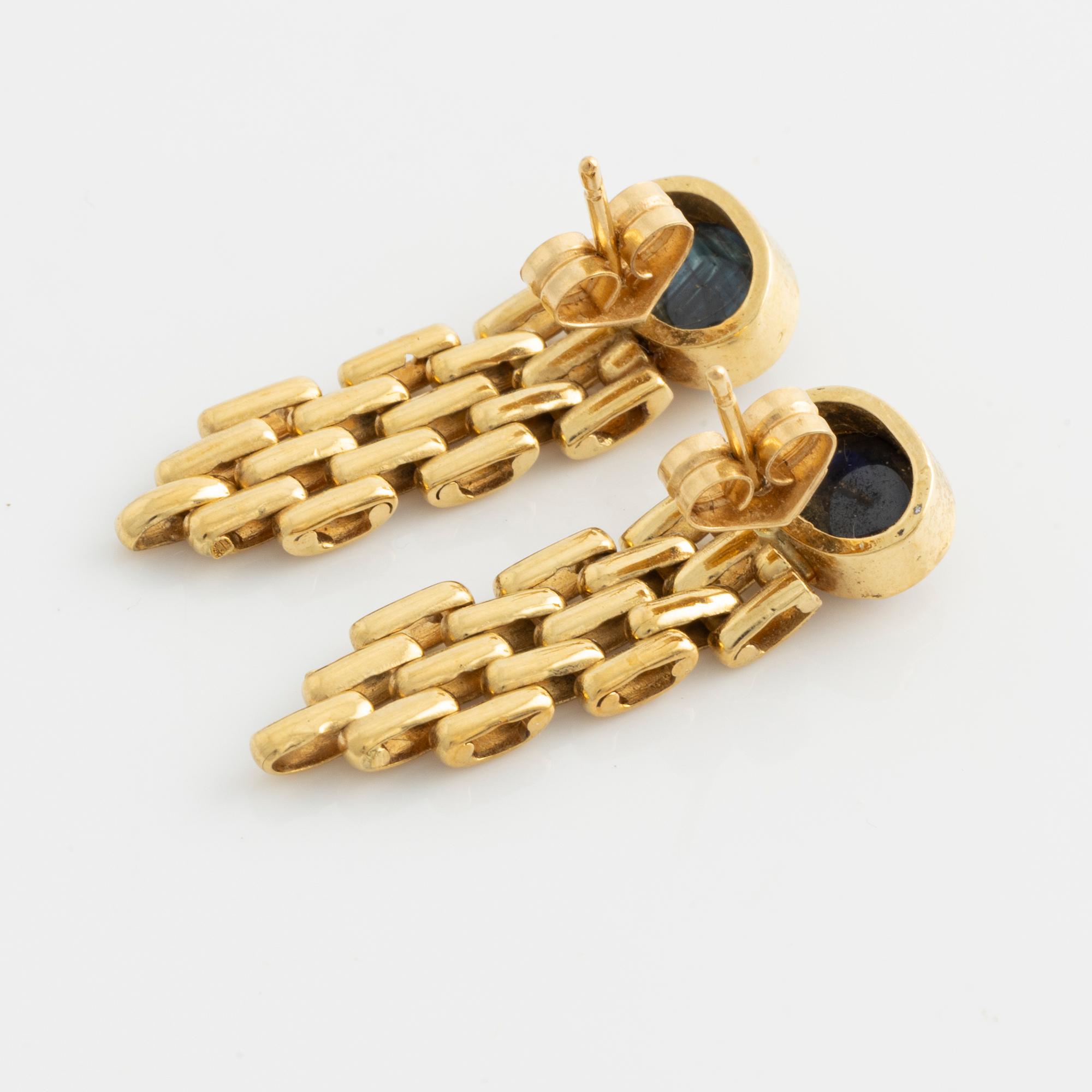 Smyckesset,  guld med cabchonslipade safirer.