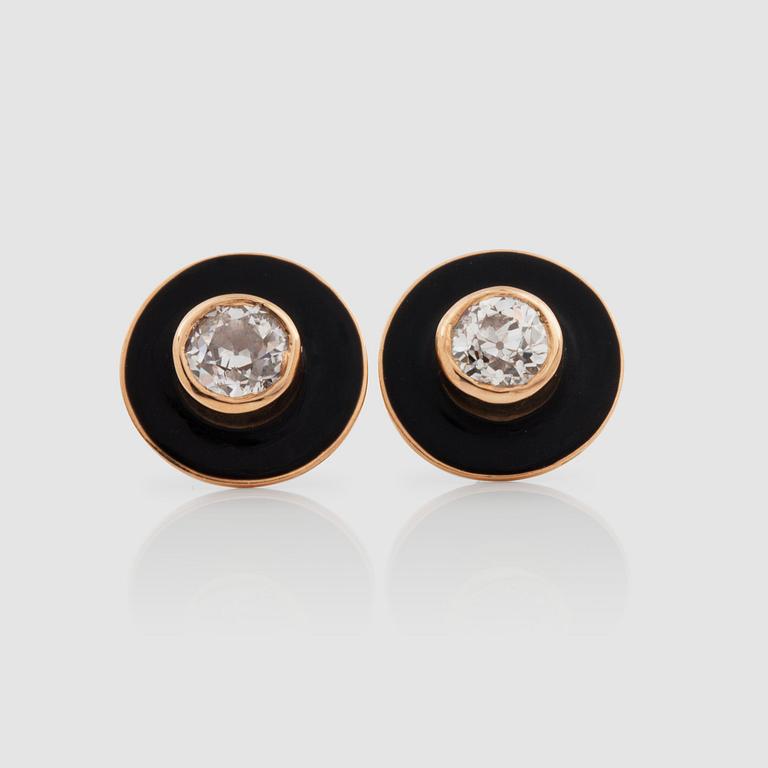A pair of black enamel and old-cut diamond earrings. Total carat weight circa 1.00 ct.