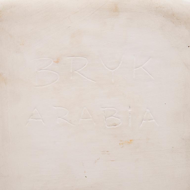 A ceramic plate signed Bryk Arabia.