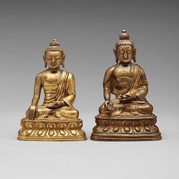 Two copper alloy figures of buddha, Sino-Tibetan, circa 1900.