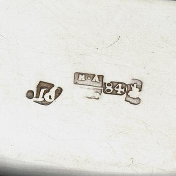 Two Russian mid 19th century parcel-gilt dishes, marked Carl Ekqvist, S:t Petersburg and unidentified maker, Moscow.