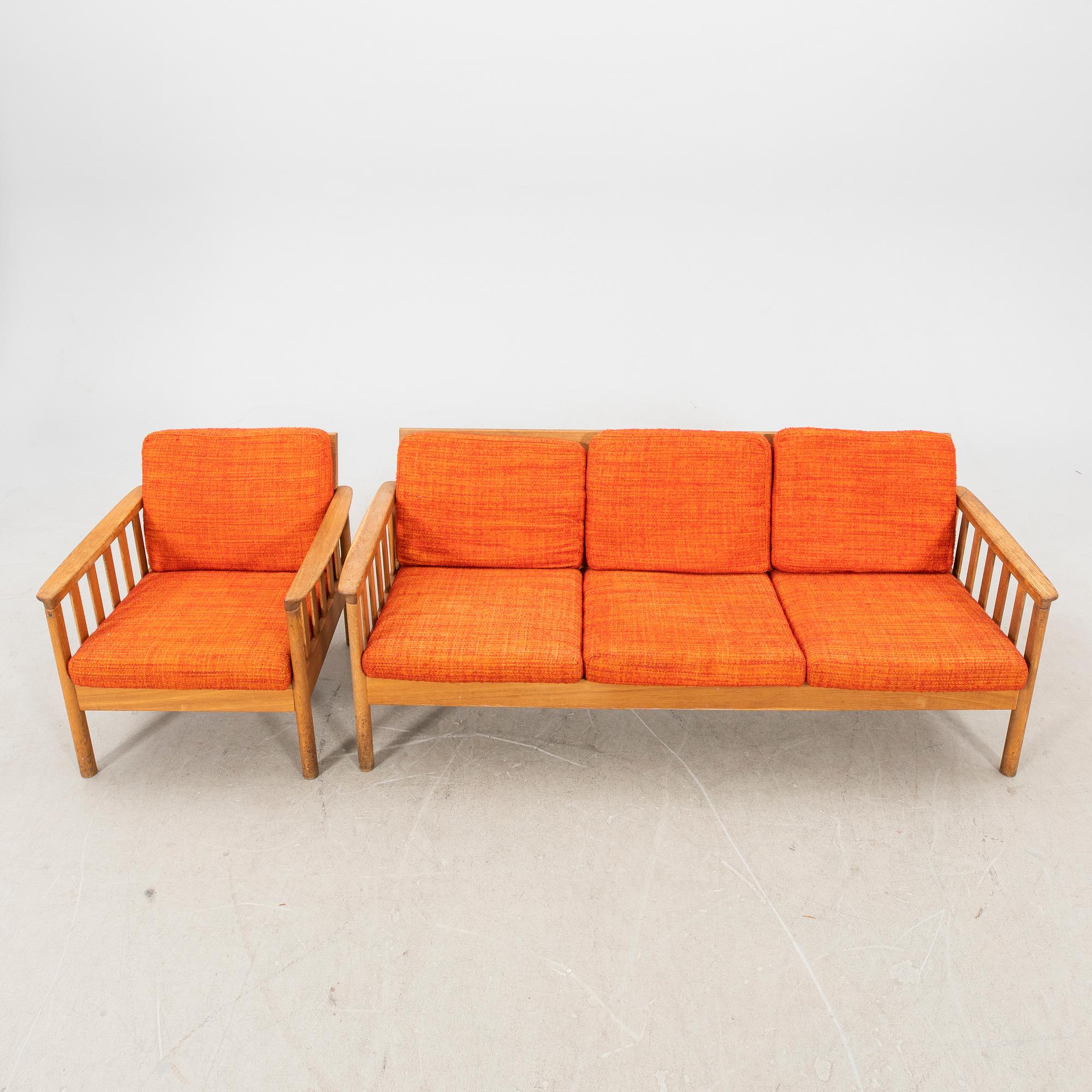 An oak easy chair ans sofa "Tiveden" by Gunnar Myrstrand & Sven Engström from the middle of the 20th century.