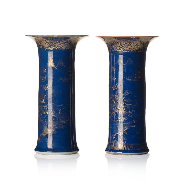 A pair of powder blue and gold 'trumpet' vases, Qing dynasty, 18th century.