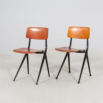 A pair of Friso Kramer Industrial 1950s chairs.