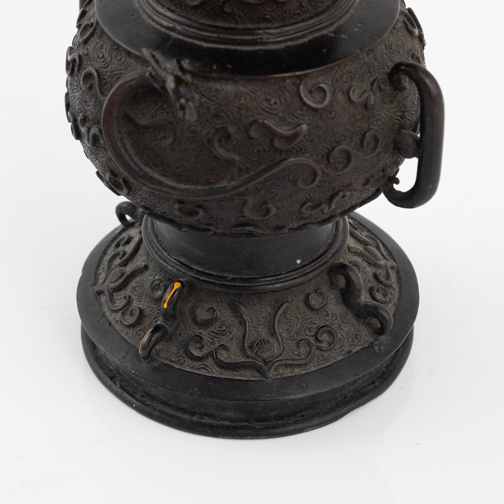 A Japanese bronze vase and censer with cover, Meiji period (1862-1912).