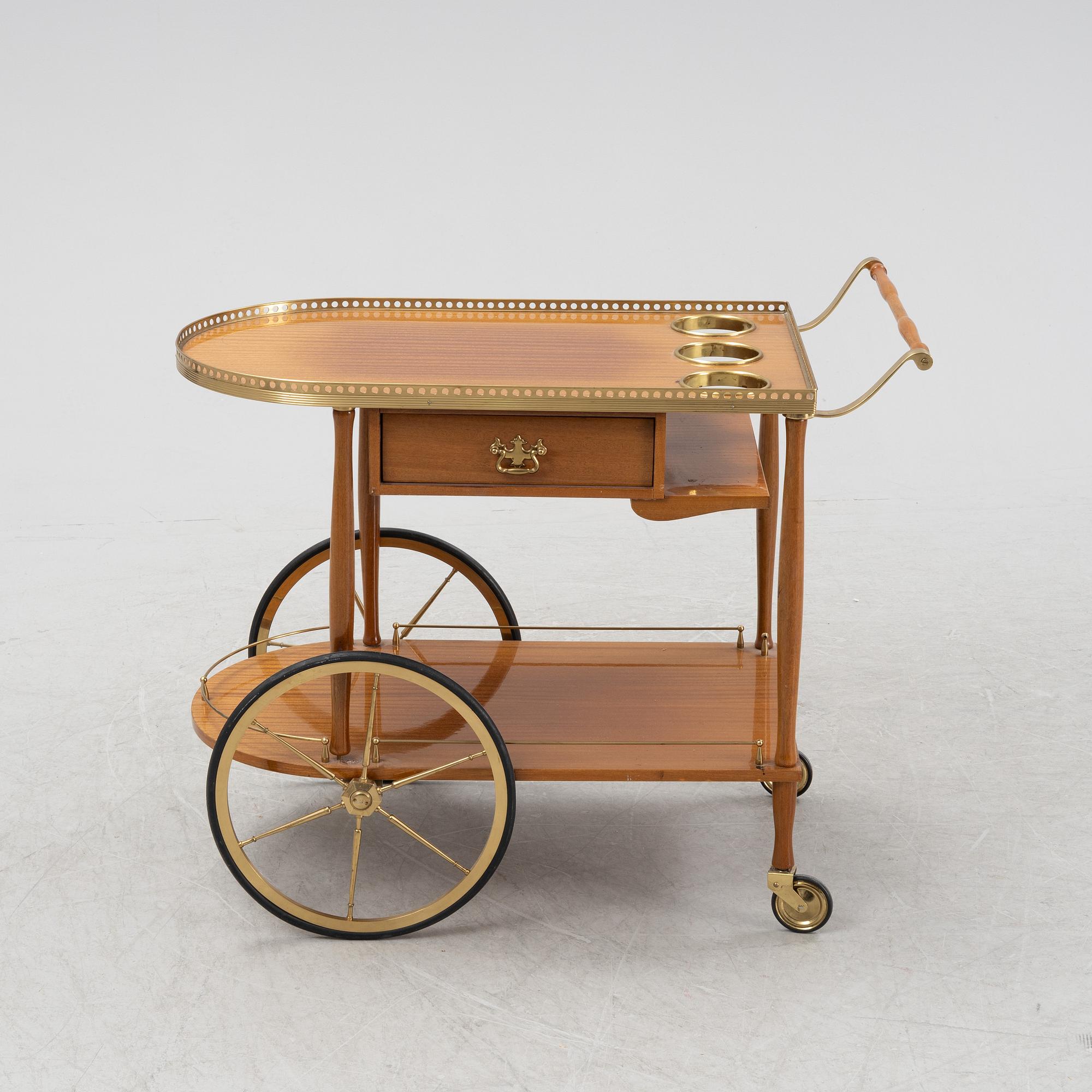 A mahogany-veneered serving trolley, mid 20th Century.