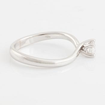 Brilliant cut diamond solitaire ring.