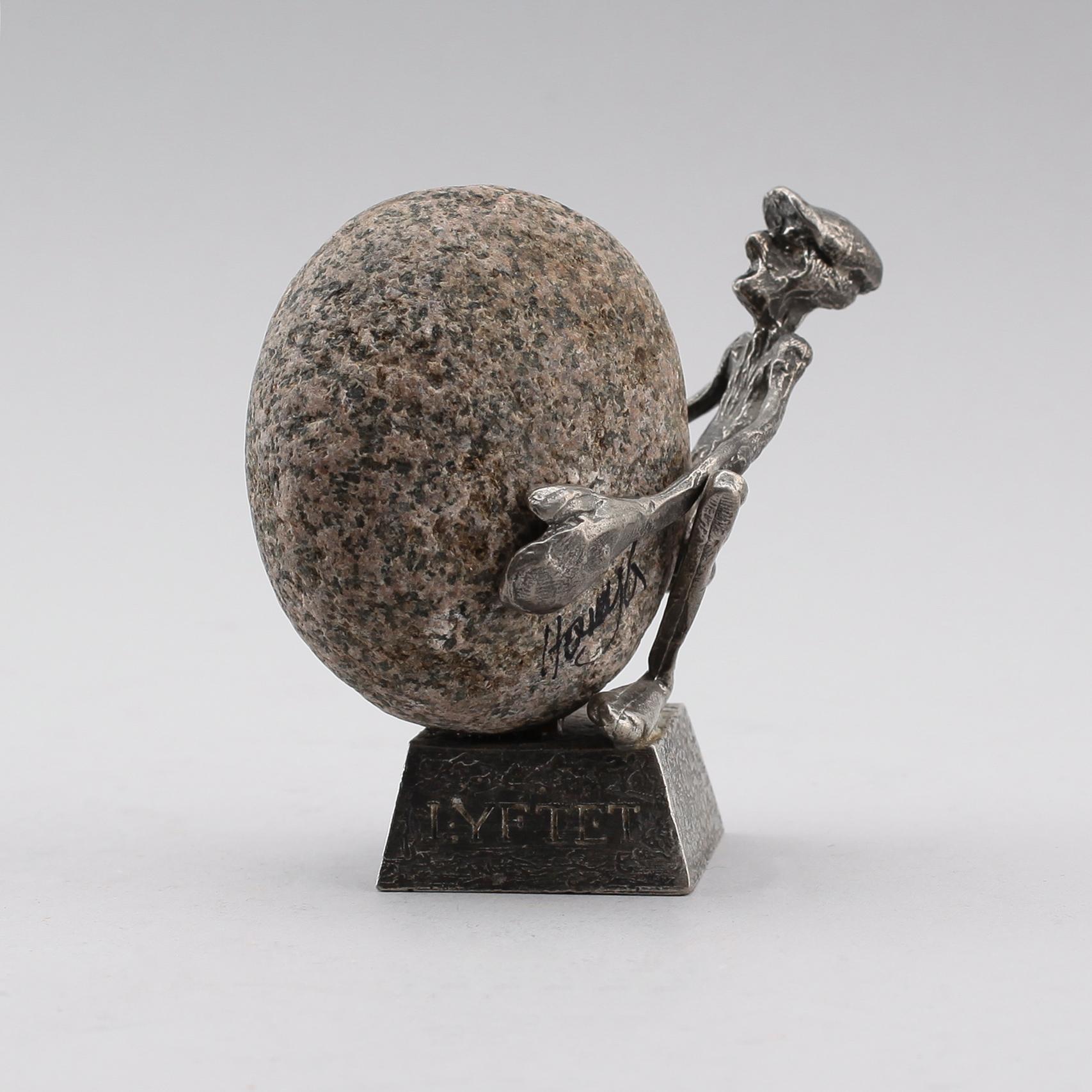 HENRY GUSTAFSSON, skulptur, "Lyftet", tenn och sten, 1989.