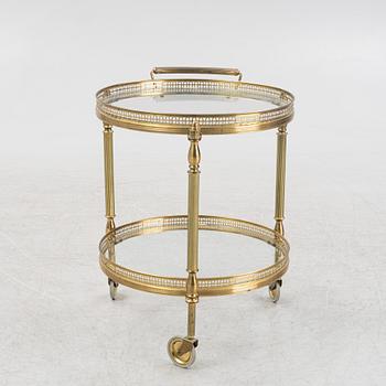 A glass and brass servin trolley, second part of the 20th Century.