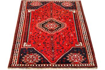 A Qashghai carpet, c. 280 x 183 cm.