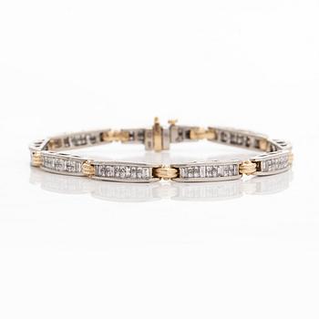 Rannekoru, 14K kultaa/valkokultaa prinsess- ja baguettehiottuja timantteja.