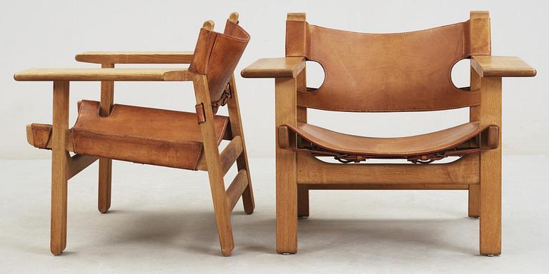 A pair of Børge Mogensen oak and leather 'Spanish Chair' by Fredericia Stolefabrik, Denmark.