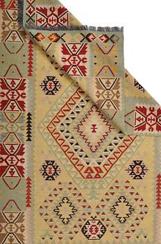 A kilim rug, approximately 245 x 150 cm.