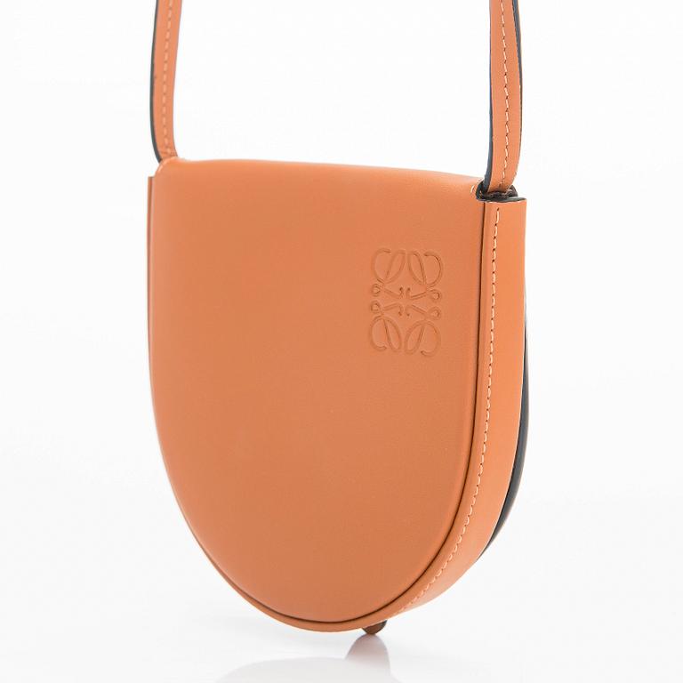 Loewe, a 'Small Heel Pouch' bag.