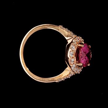 A pink tourmaline and diamond ring. Tourmaline 3.07 cts, and diamonds total carat weight 0.87 ct.
