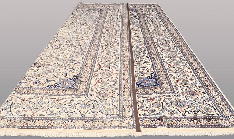 A CARPET, Nain part silk, s.k 9 LAA, 588 x 393 cm.