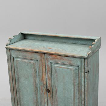 A first half of the 19th century painted cupboard.