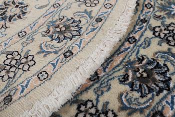 A rug, Nain, part silk, ca 136 x 136 cm.