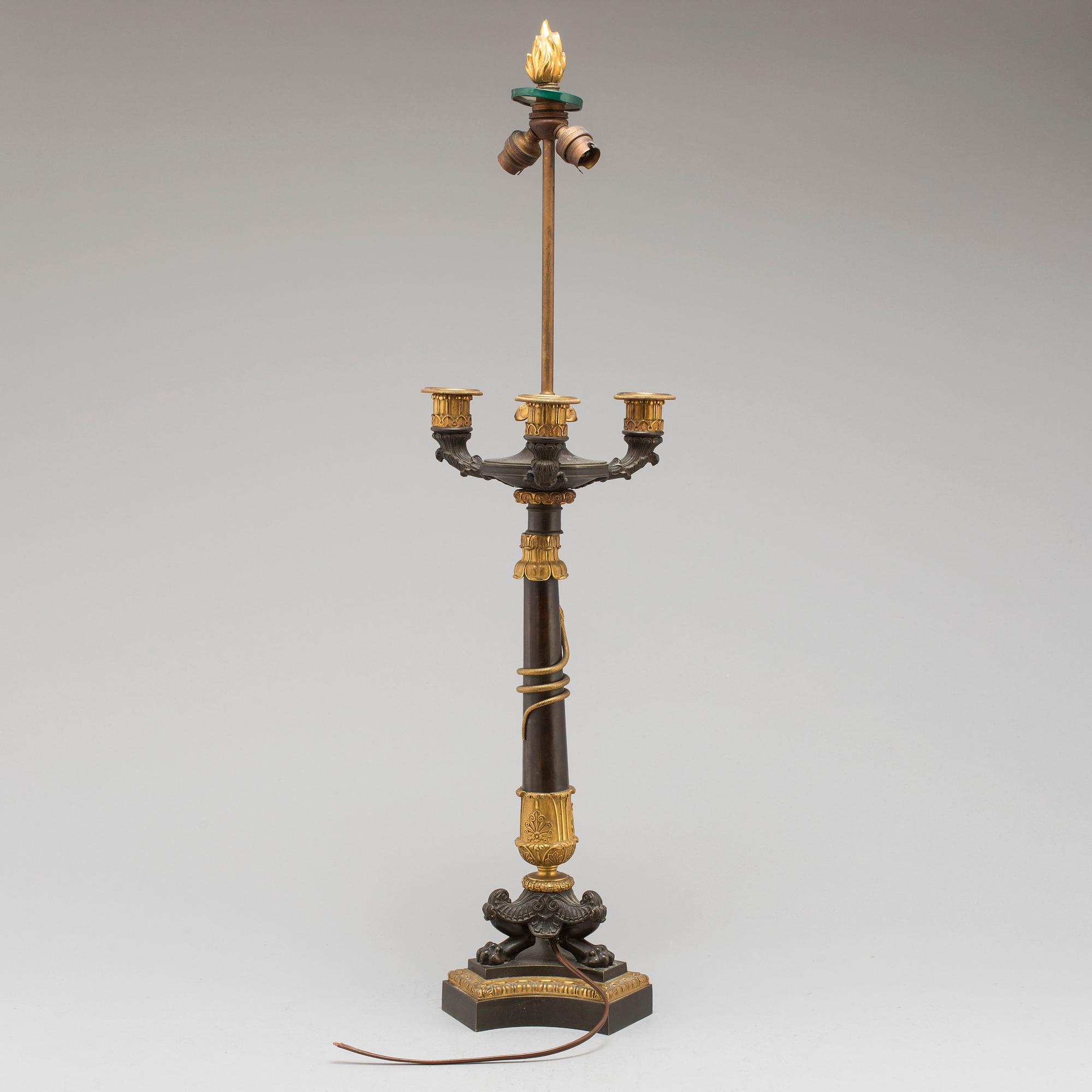 A first half of the 19th century bronze table lamp.