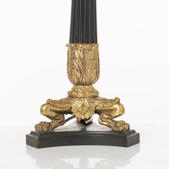 A pair of table lamps/reworked candle sticks, Empire, France, first half of the 20th century.