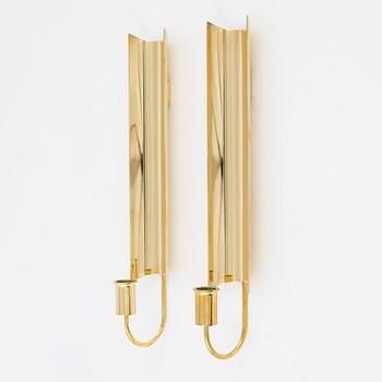 Pierre Forssell, a pair of 'Reflex' brass wall sconses, Skultuna.