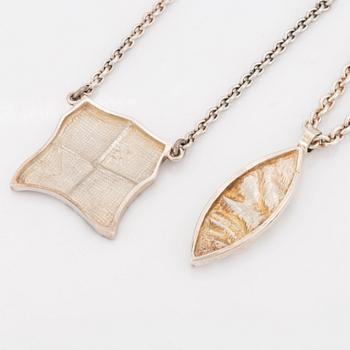 Rolf Karlsson two silver necklaces.