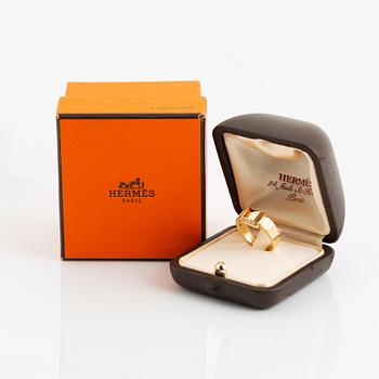 Hermès ring 18K guld med runda briljantslipade diamanter.