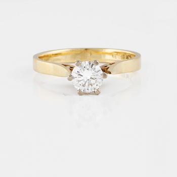 RING, 18K guld och vitguld med briljantslipad diamant 0.59. Vikt 3,2 gram.