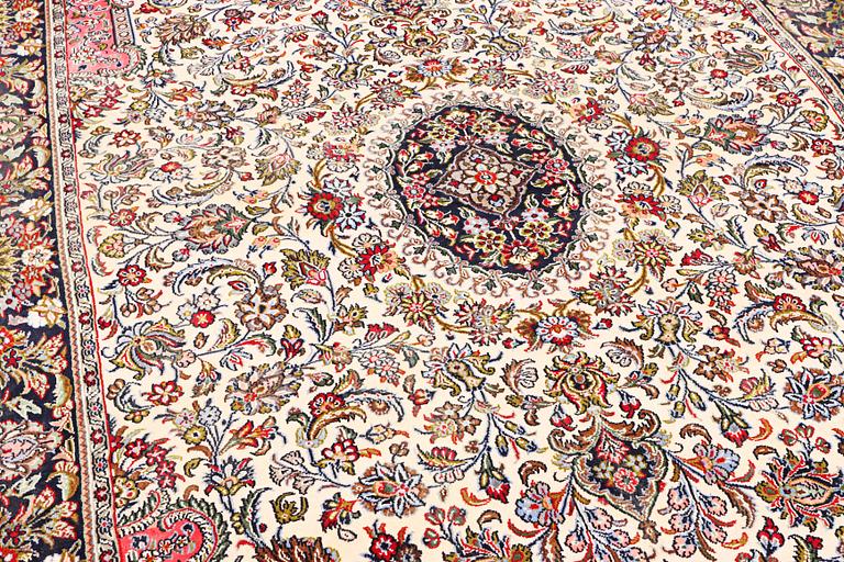 A Quum rug, c. 204 x 134 cm.