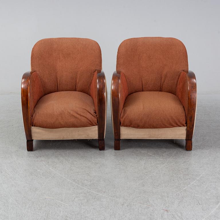 A pair of 1930's easy chairs.