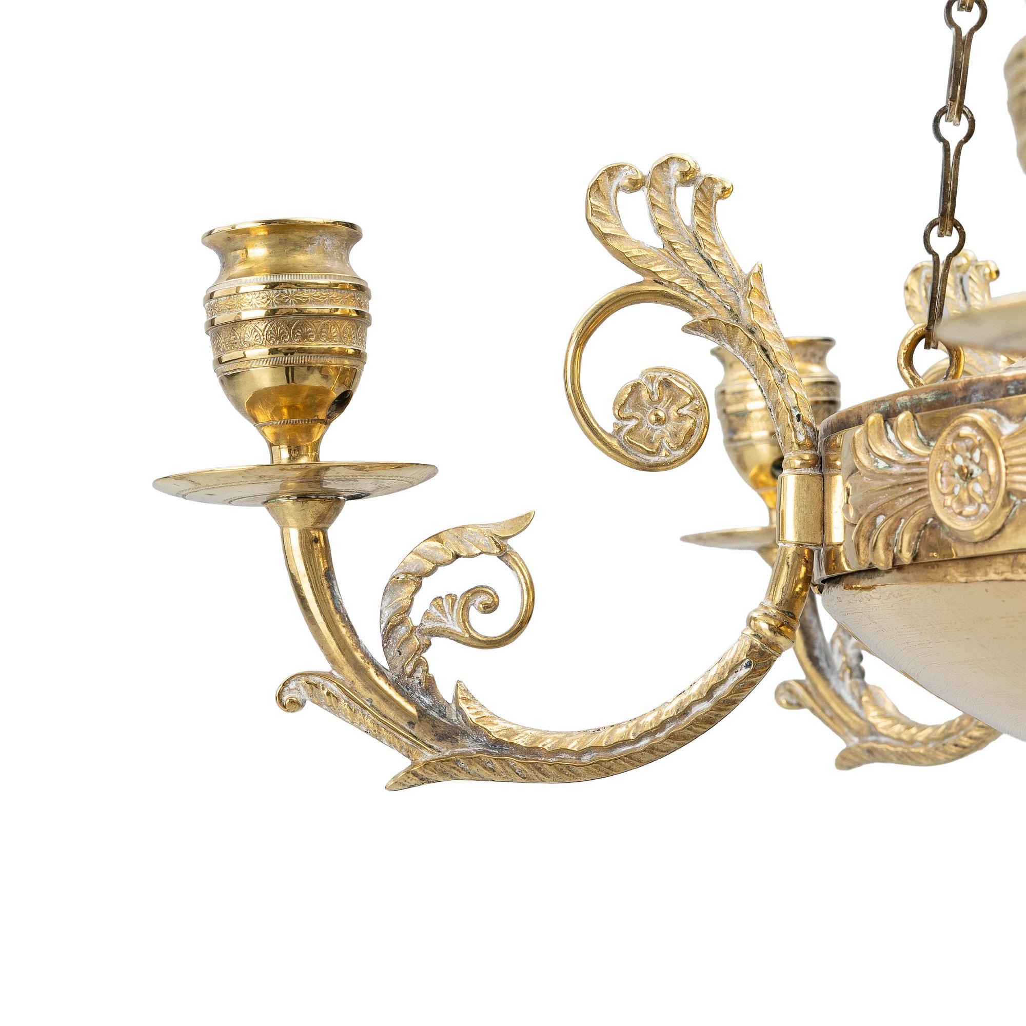 A Swedish Empire gilt brass six-branch chandelier, early 19th century.
