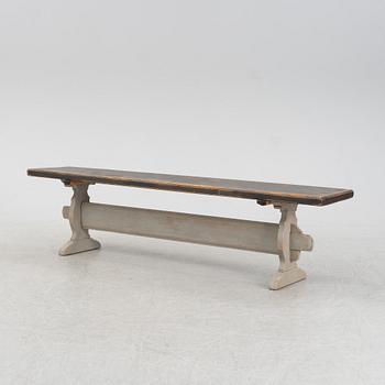 A wooden bench, around 1900.