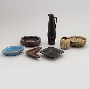 Gunnar Nylund, a set of two stoneware ashtrays, three bowls, a jug and a vase, Rörstrand.