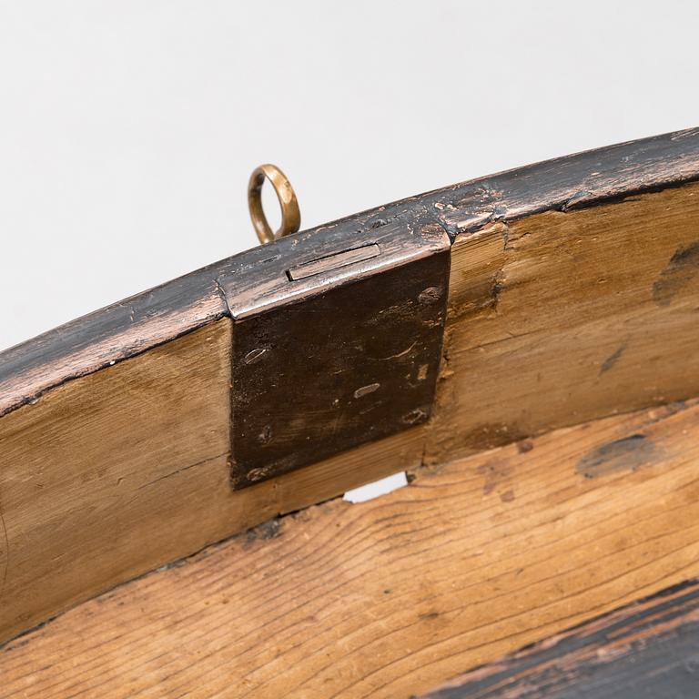 An 18th-Century chest of drawers.