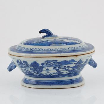 A blue and white tureen with cover, a plate and a butter tureen with cover and stand, China, 18th and 19th century.