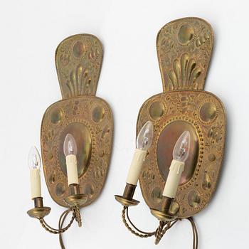 A pair of late 19th century Baroque style brass sconces.