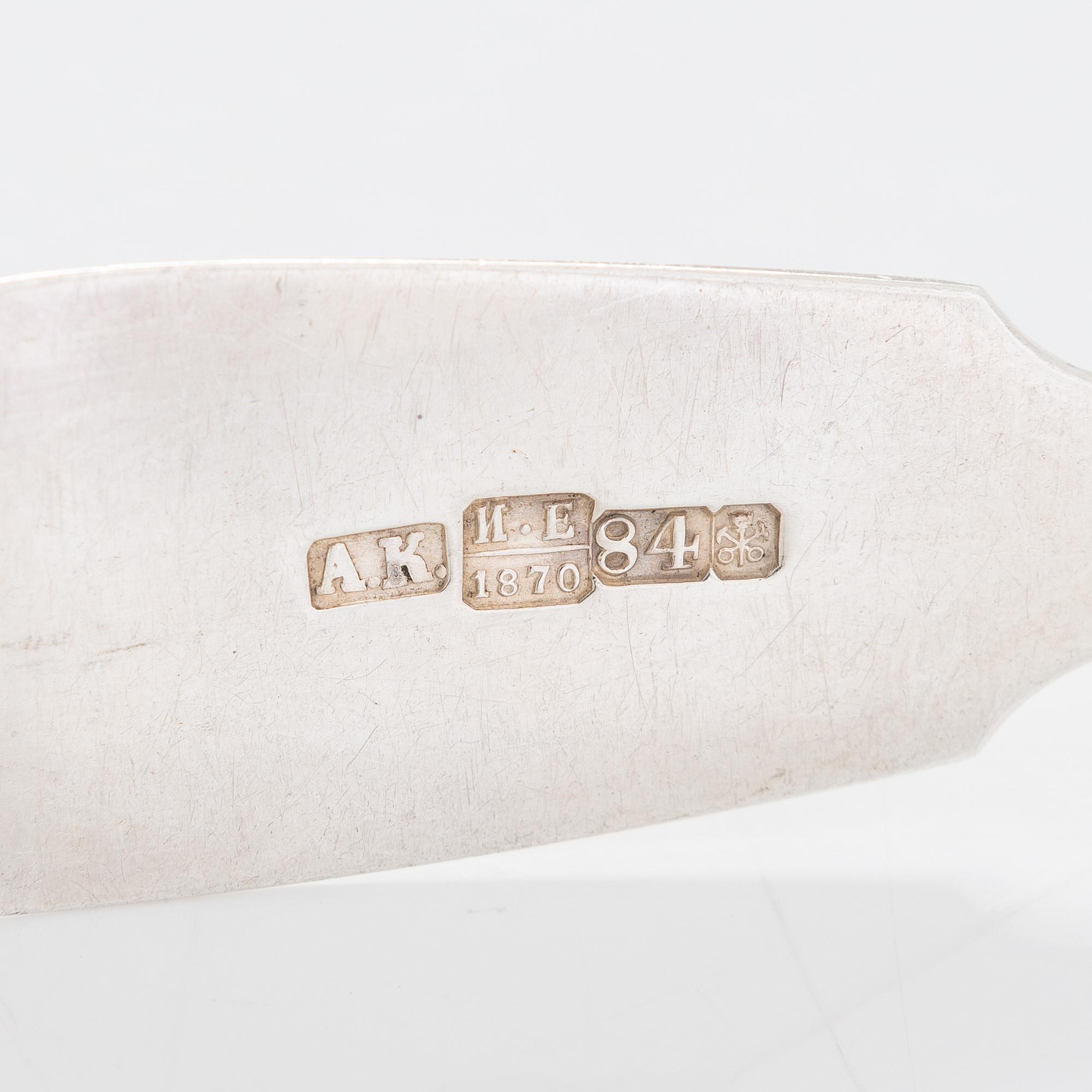 A 24-piece set of silver cutlery, Saint Petersburg 1870. Maker's mark A.K.