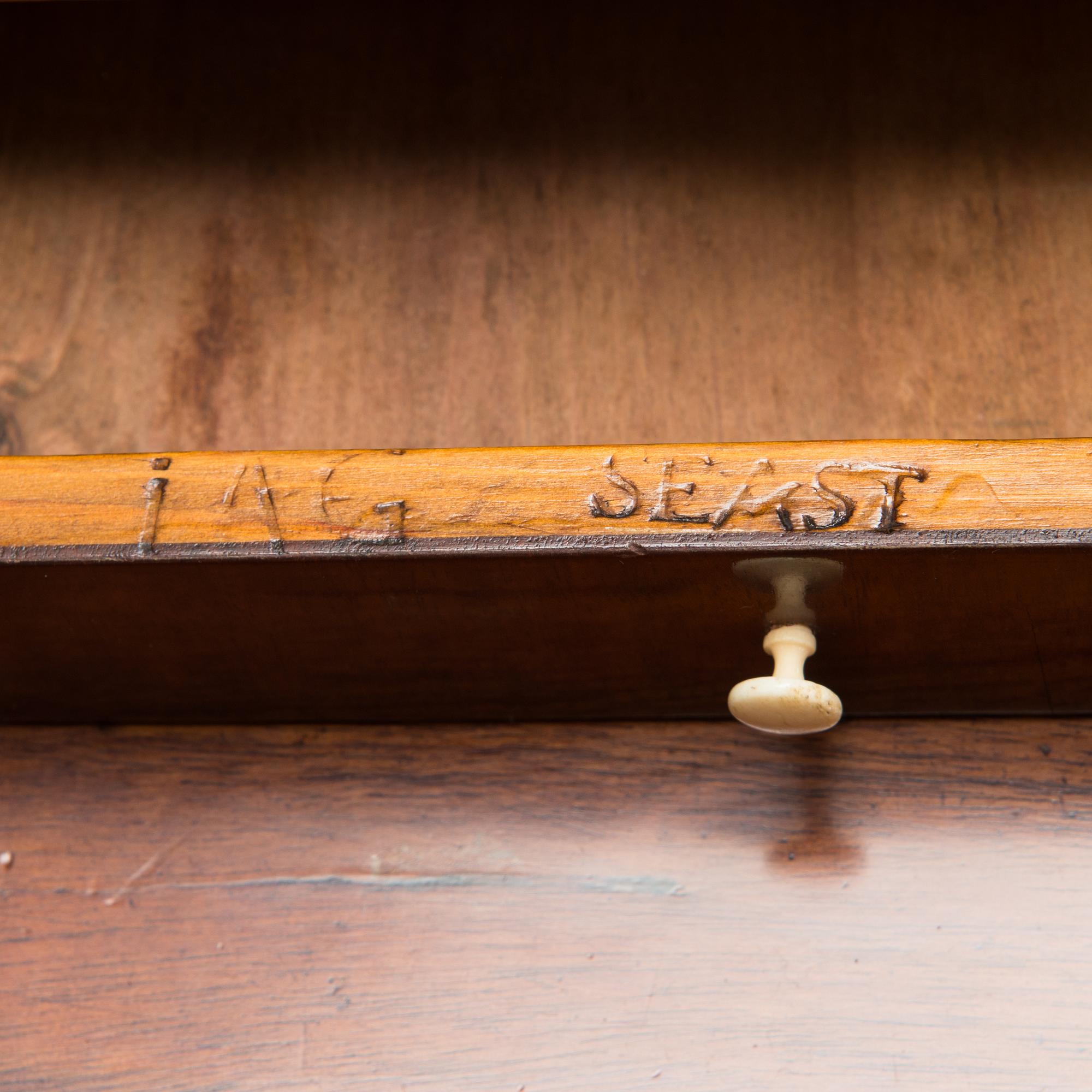 A late Gustavian writing commode by Johan Almgren, master 1798-1805 in Stockholm. Signed.