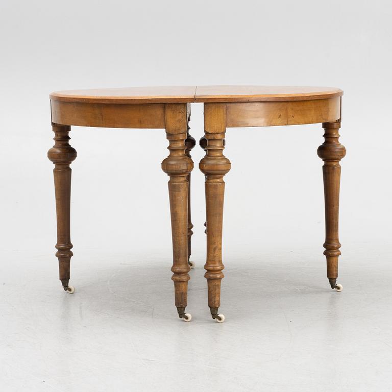 A dining table, late 19th Century.