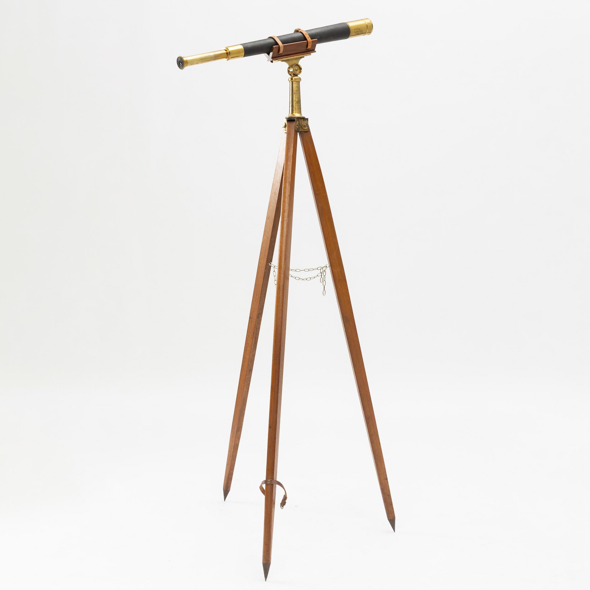 A 20th century telescope on a tripod.