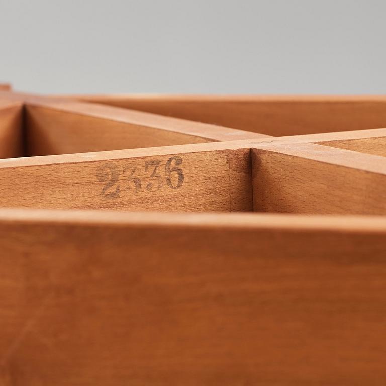 A Swedish Modern travertine top coffee table, mid 20th century.